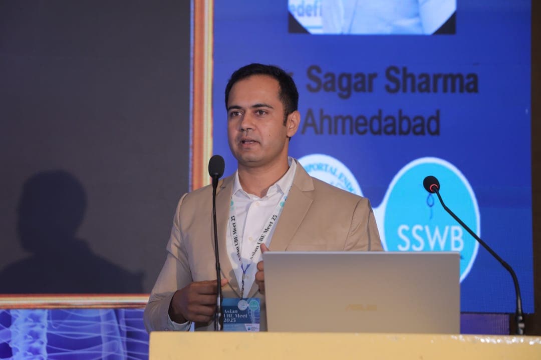 Dr. Sagar Sharma speaking at the Asian UBE Meet 2025 in Ahmedabad