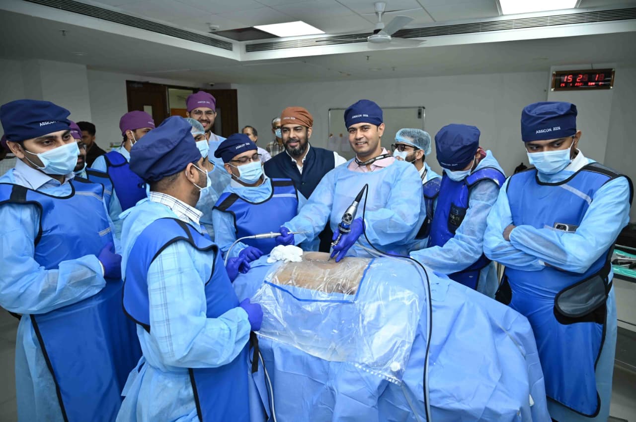 Dr. Sagar Sharma leading a hands-on spine surgery workshop at ASSICON 2026