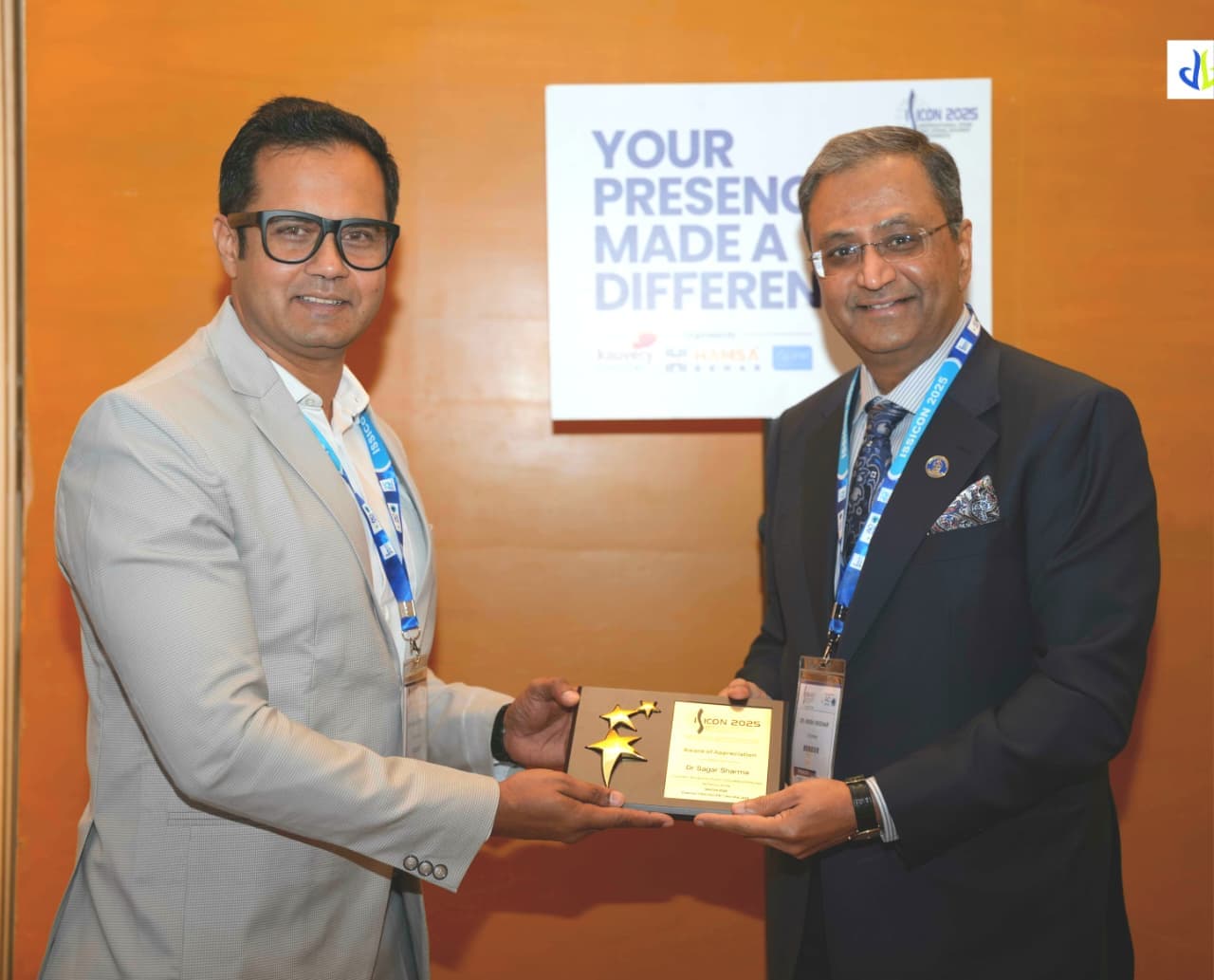 Dr. Sagar Sharma receiving an Award of Appreciation at ISSICON 2025